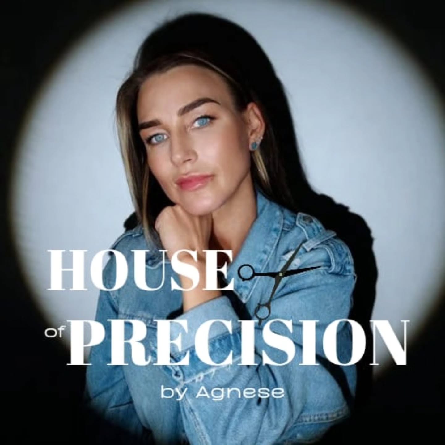 Agnese, barber at House of Precision, in a blue denim jacket